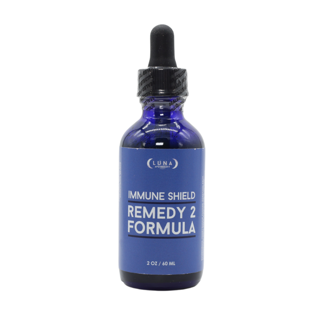 Immune Shield Remedy Formula in a 2 oz bottle, designed to enhance immune defense and support overall health. This natural supplement helps strengthen the immune system and promotes resilience.